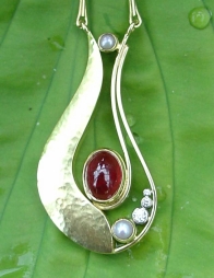 18ct White gold Locket Pendant with Emeralds and Diamonds.