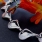 Sterling silver interlinking Swan necklace.