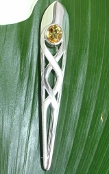 Sterling silver Celtic style Kilt Pin with a Citrine and a polished, textured finish.